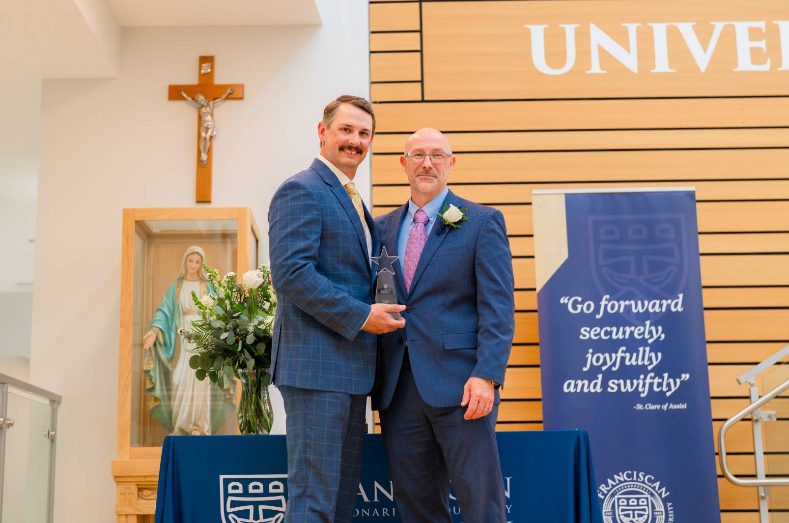 Joshua Todd recieving award